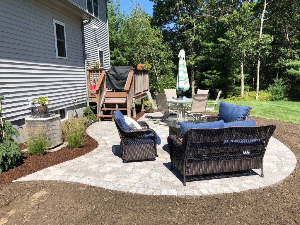 Back yard with stone paver patio