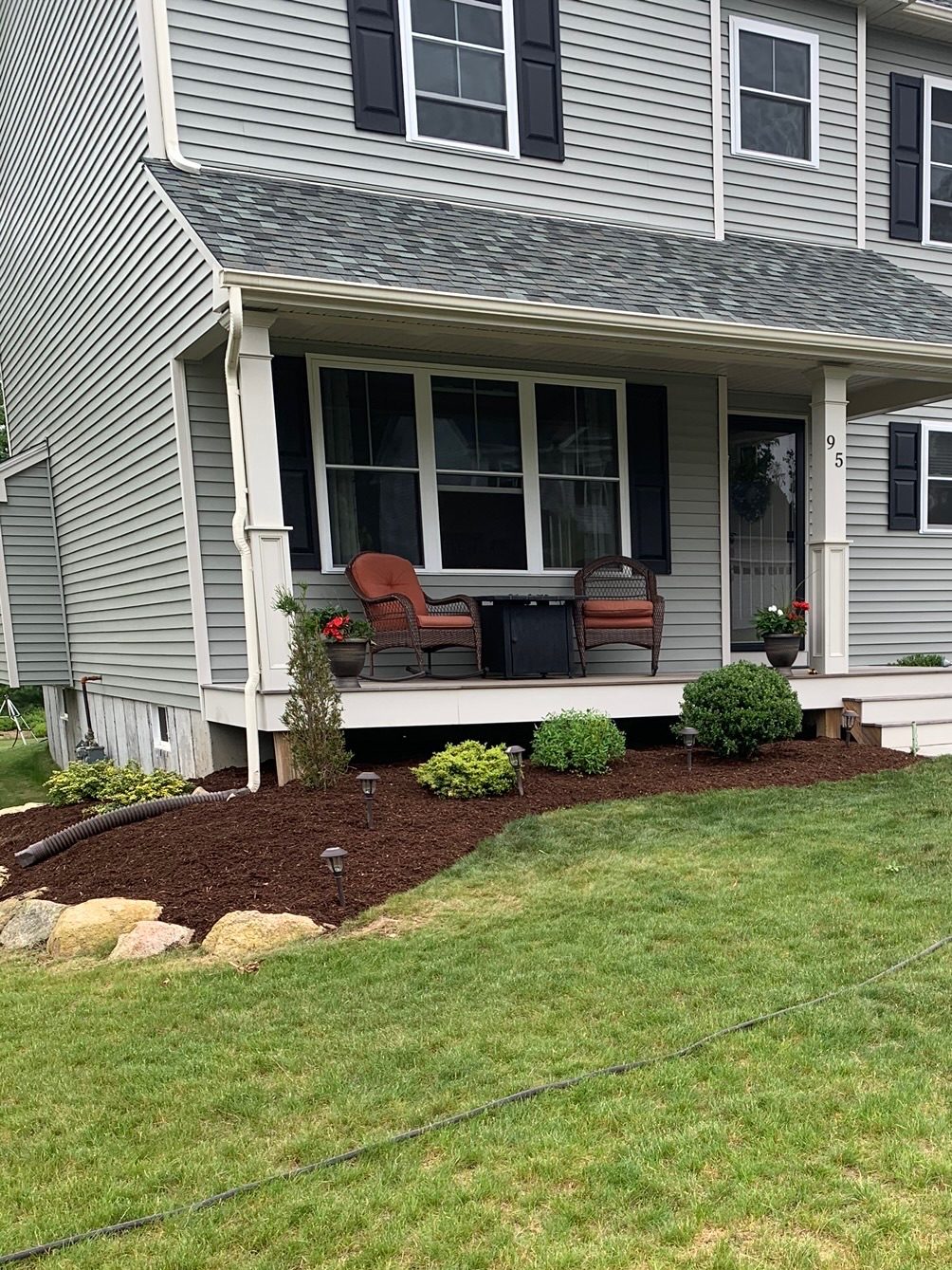 Front of house with mulch